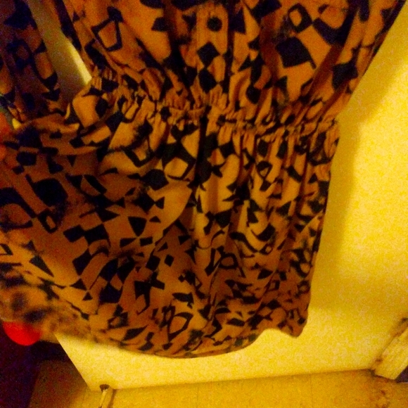 This little cut out mini skirt and backless out fit is perfect for a night out. - Picture 1 of 5